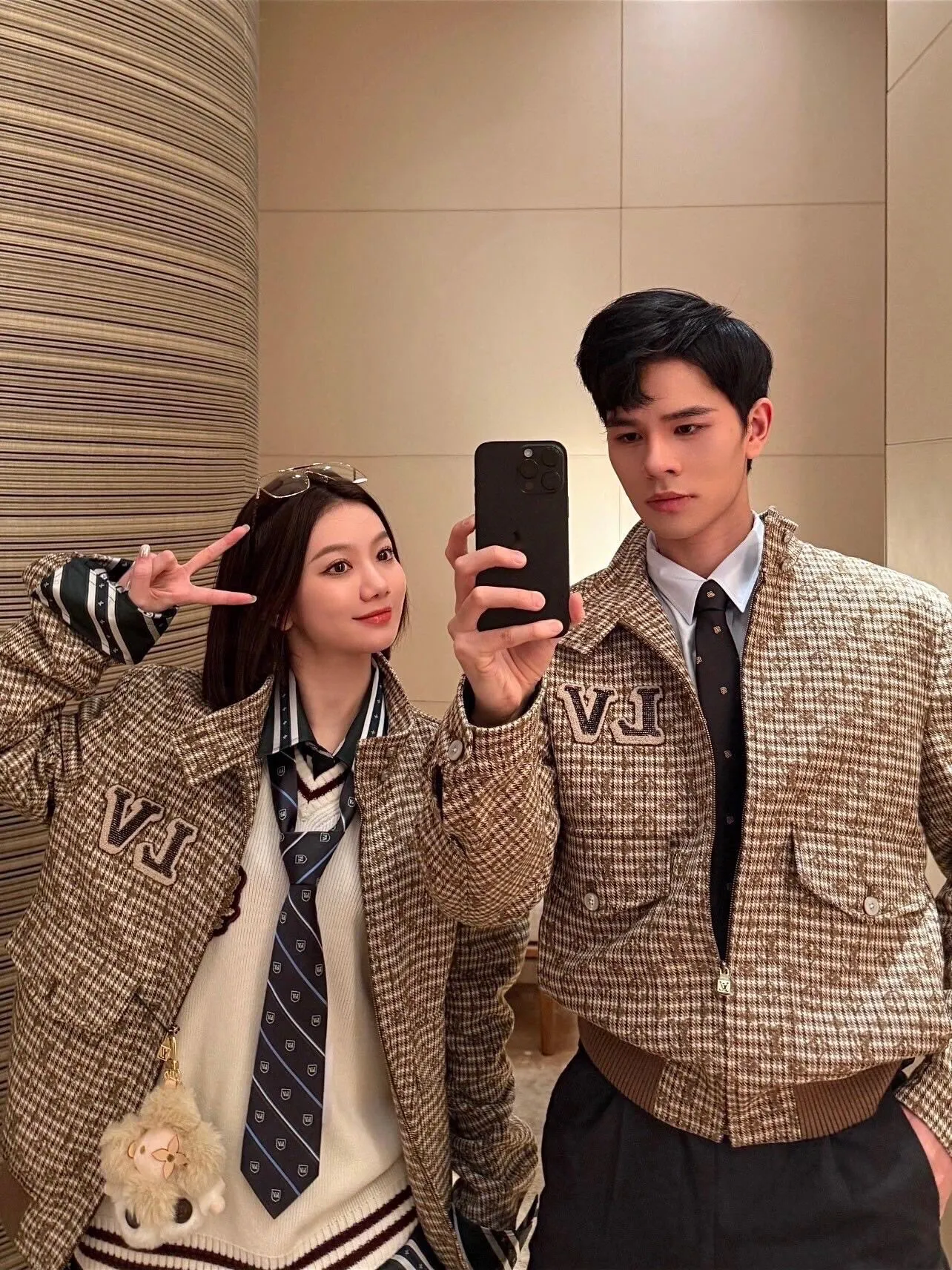 Louis Vuitton jacket with embroidered badges and all-over monogram print.
